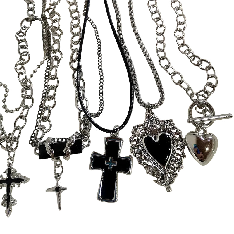 Collection of silver necklaces with various pendants on a white background